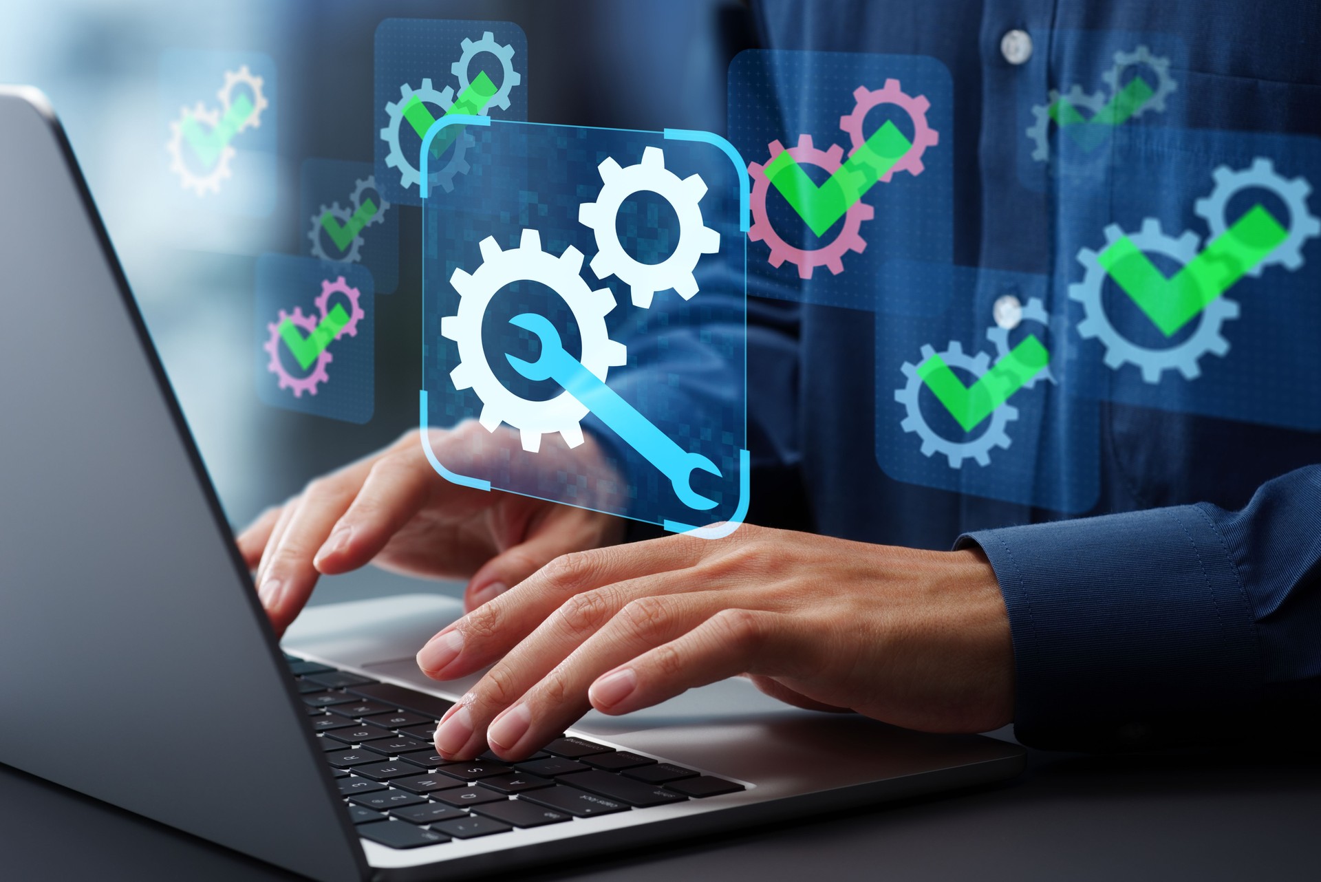 Coding and development automation. Automated maintenance and system updates. Engineer using laptop computer to optimize and improve systems.